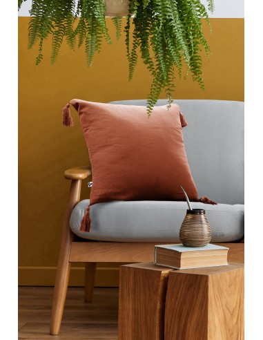 Coussin déhoussable avec pompons...